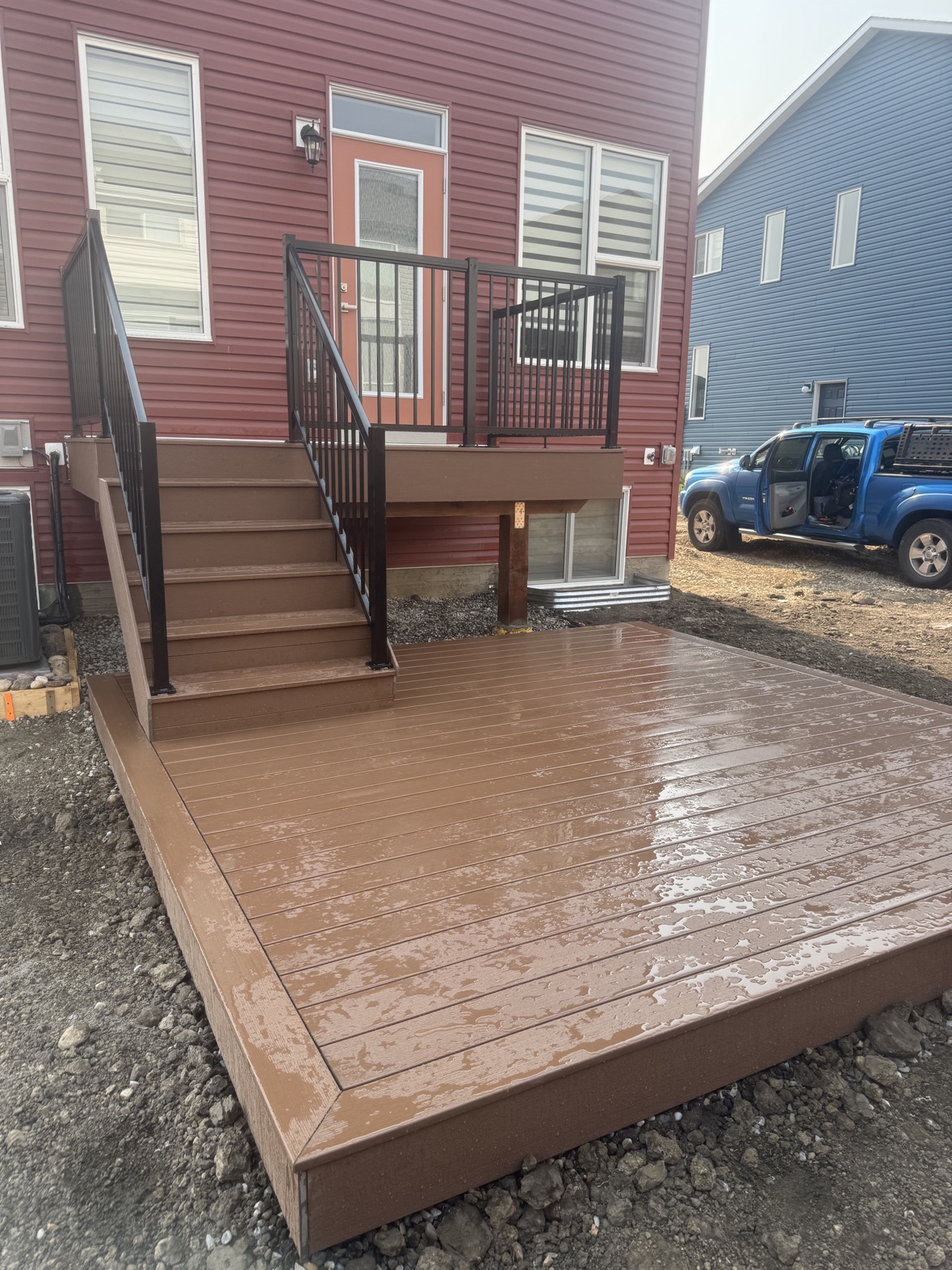 Finished composite deck with black aluminum railings. — decks reference photo